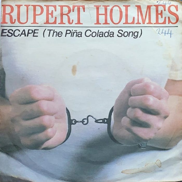 Parels van de Popmuziek: Het verhaal achter Rupert Holmes – ‘Escape (The Piña Colada Song)’